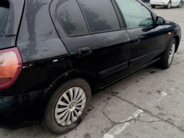 Черный Ниссан Альмера, объемом двигателя 1.5 л и пробегом 200 тыс. км за 3850 $, фото 4 на Automoto.ua