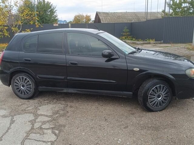 Черный Ниссан Альмера, объемом двигателя 1.5 л и пробегом 205 тыс. км за 3700 $, фото 1 на Automoto.ua