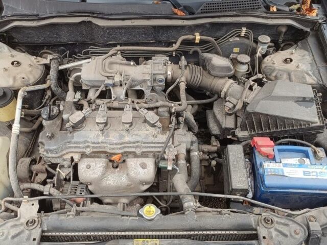 Черный Ниссан Альмера, объемом двигателя 1.5 л и пробегом 205 тыс. км за 3700 $, фото 7 на Automoto.ua