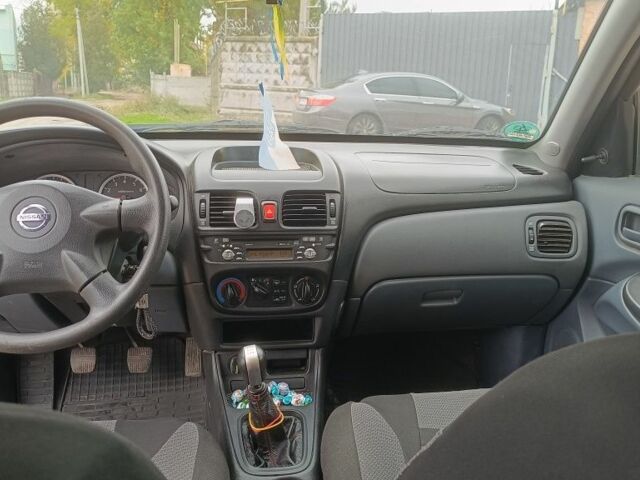 Черный Ниссан Альмера, объемом двигателя 1.5 л и пробегом 205 тыс. км за 3700 $, фото 6 на Automoto.ua