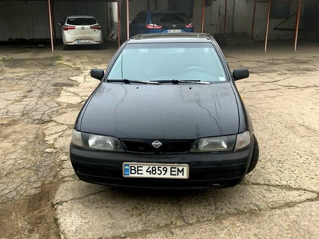 Черный Ниссан Альмера, объемом двигателя 1.4 л и пробегом 0 тыс. км за 1700 $, фото 2 на Automoto.ua