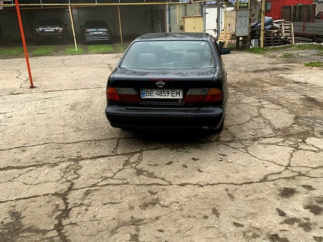 Черный Ниссан Альмера, объемом двигателя 1.4 л и пробегом 0 тыс. км за 1700 $, фото 3 на Automoto.ua
