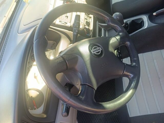 Черный Ниссан Альмера, объемом двигателя 2.2 л и пробегом 350 тыс. км за 2700 $, фото 4 на Automoto.ua