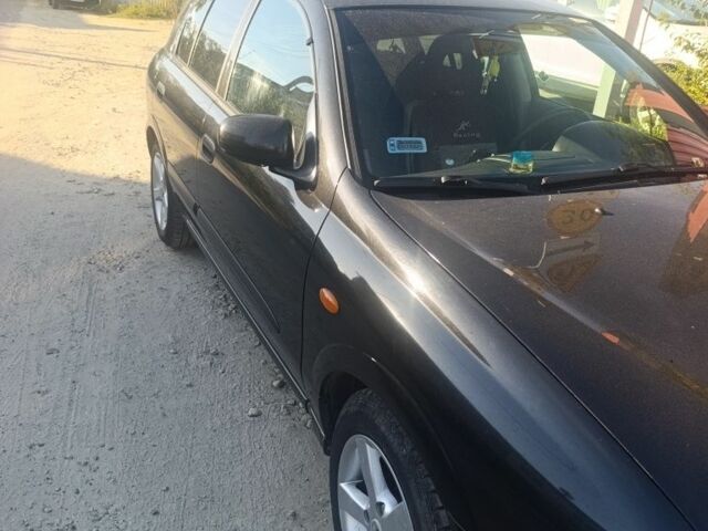 Черный Ниссан Альмера, объемом двигателя 2.2 л и пробегом 350 тыс. км за 2700 $, фото 2 на Automoto.ua