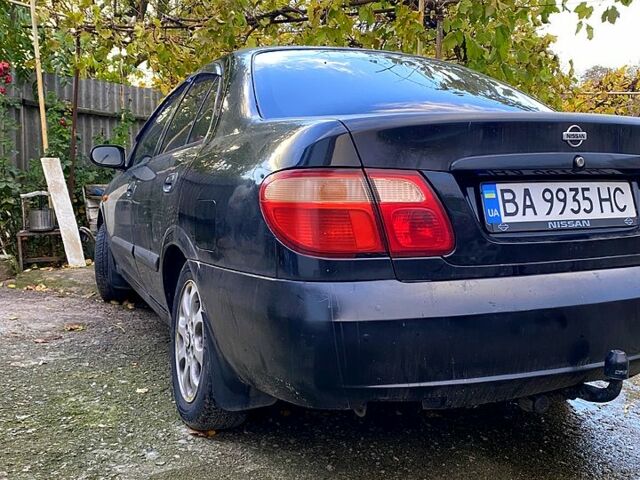 Черный Ниссан Альмера, объемом двигателя 1.5 л и пробегом 221 тыс. км за 3500 $, фото 8 на Automoto.ua