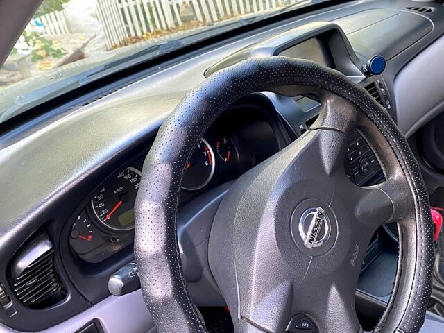 Черный Ниссан Альмера, объемом двигателя 1.5 л и пробегом 221 тыс. км за 3500 $, фото 5 на Automoto.ua