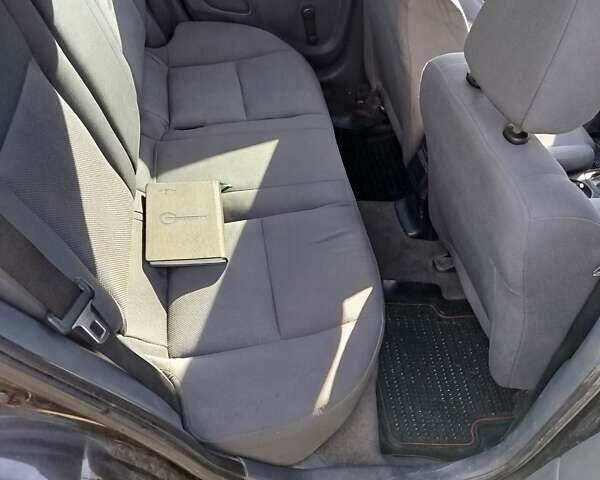 Черный Ниссан Альмера, объемом двигателя 1.5 л и пробегом 269 тыс. км за 2550 $, фото 18 на Automoto.ua