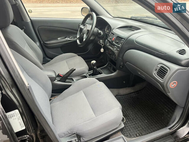 Черный Ниссан Альмера, объемом двигателя 1.77 л и пробегом 203 тыс. км за 3200 $, фото 19 на Automoto.ua