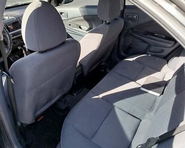 Черный Ниссан Альмера, объемом двигателя 1.5 л и пробегом 269 тыс. км за 2550 $, фото 20 на Automoto.ua