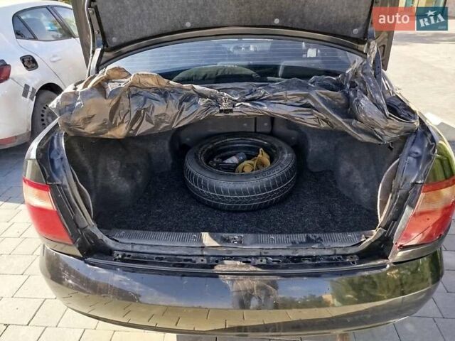 Черный Ниссан Альмера, объемом двигателя 1.5 л и пробегом 269 тыс. км за 2550 $, фото 28 на Automoto.ua