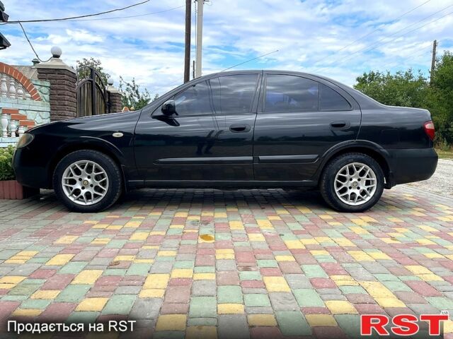 Черный Ниссан Альмера, объемом двигателя 1.5 л и пробегом 220 тыс. км за 2700 $, фото 12 на Automoto.ua