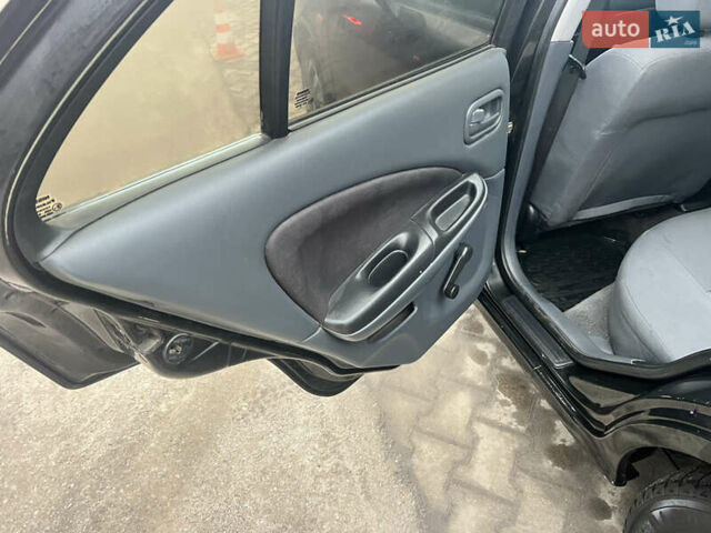 Черный Ниссан Альмера, объемом двигателя 1.77 л и пробегом 203 тыс. км за 3200 $, фото 18 на Automoto.ua