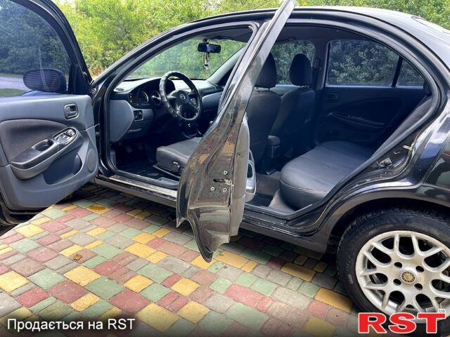 Черный Ниссан Альмера, объемом двигателя 1.5 л и пробегом 220 тыс. км за 2700 $, фото 13 на Automoto.ua