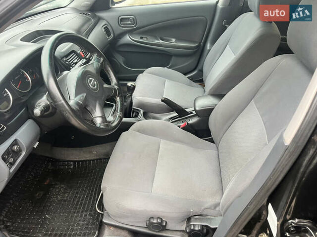 Черный Ниссан Альмера, объемом двигателя 1.77 л и пробегом 203 тыс. км за 3200 $, фото 14 на Automoto.ua