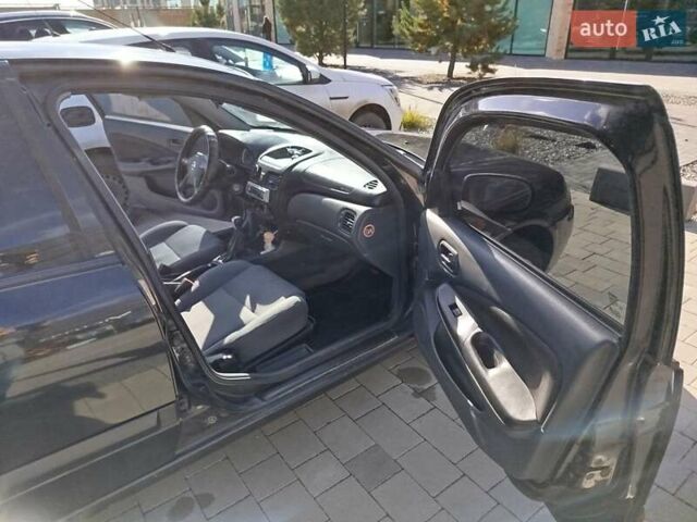 Черный Ниссан Альмера, объемом двигателя 1.5 л и пробегом 269 тыс. км за 2550 $, фото 19 на Automoto.ua