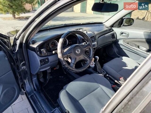 Черный Ниссан Альмера, объемом двигателя 1.5 л и пробегом 269 тыс. км за 2550 $, фото 5 на Automoto.ua