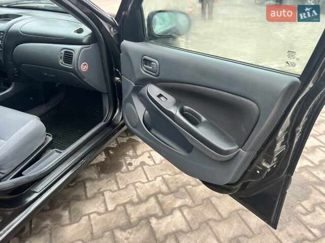 Черный Ниссан Альмера, объемом двигателя 1.77 л и пробегом 203 тыс. км за 3200 $, фото 20 на Automoto.ua