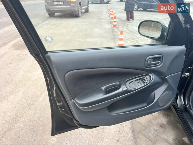 Черный Ниссан Альмера, объемом двигателя 1.77 л и пробегом 203 тыс. км за 3200 $, фото 16 на Automoto.ua