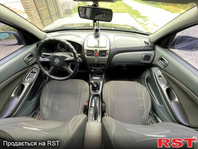 Черный Ниссан Альмера, объемом двигателя 1.5 л и пробегом 220 тыс. км за 2700 $, фото 10 на Automoto.ua