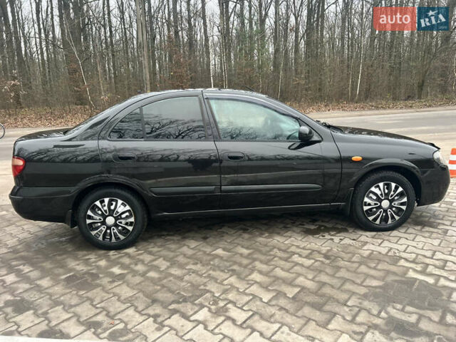 Черный Ниссан Альмера, объемом двигателя 1.77 л и пробегом 203 тыс. км за 3200 $, фото 11 на Automoto.ua