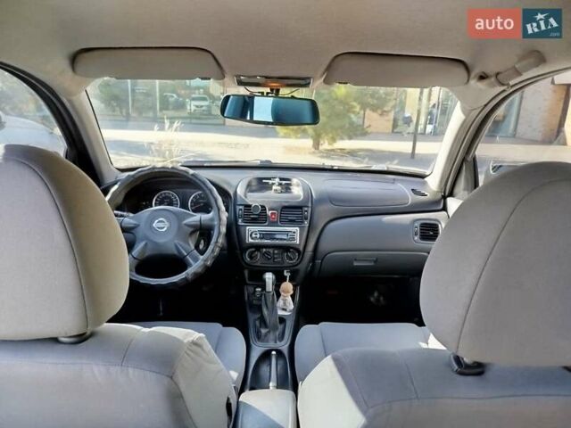 Черный Ниссан Альмера, объемом двигателя 1.5 л и пробегом 269 тыс. км за 2550 $, фото 4 на Automoto.ua