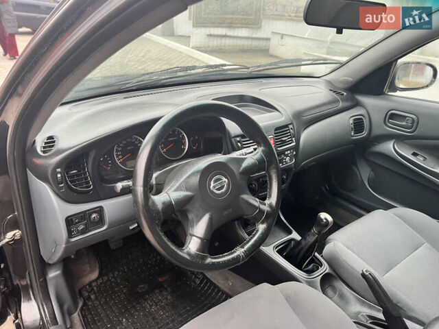 Черный Ниссан Альмера, объемом двигателя 1.77 л и пробегом 203 тыс. км за 3200 $, фото 15 на Automoto.ua
