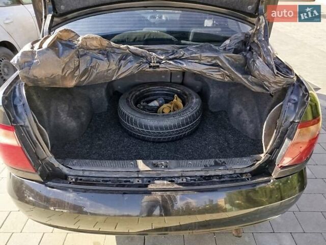 Черный Ниссан Альмера, объемом двигателя 1.5 л и пробегом 269 тыс. км за 2550 $, фото 30 на Automoto.ua