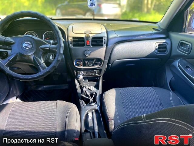 Черный Ниссан Альмера, объемом двигателя 1.5 л и пробегом 220 тыс. км за 2700 $, фото 3 на Automoto.ua