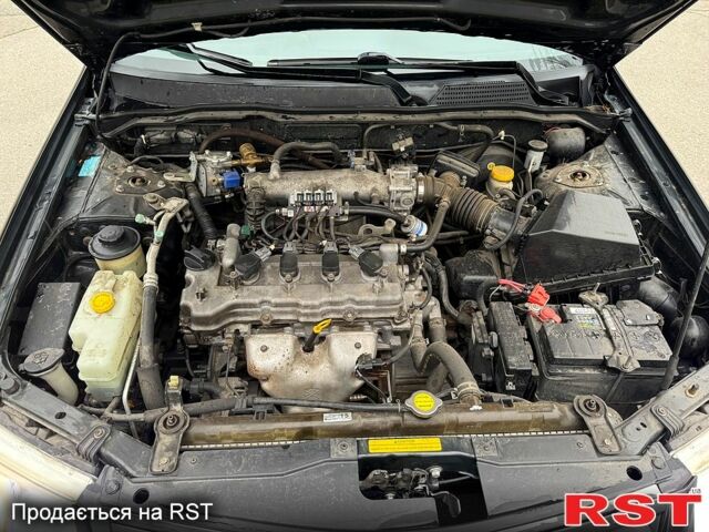 Чорний Ніссан Альмера, об'ємом двигуна 1.6 л та пробігом 245 тис. км за 4600 $, фото 11 на Automoto.ua