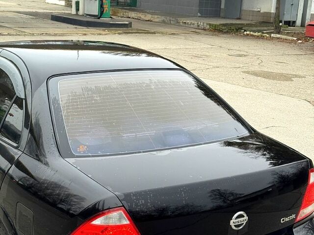 Чорний Ніссан Альмера, об'ємом двигуна 1.6 л та пробігом 245 тис. км за 4600 $, фото 9 на Automoto.ua