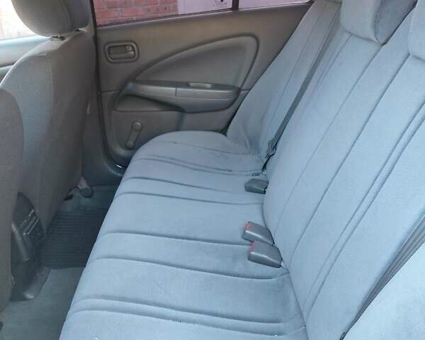 Чорний Ніссан Альмера, об'ємом двигуна 1.6 л та пробігом 210 тис. км за 4600 $, фото 10 на Automoto.ua