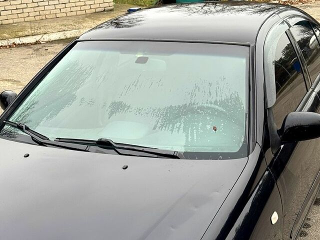 Чорний Ніссан Альмера, об'ємом двигуна 1.6 л та пробігом 245 тис. км за 4600 $, фото 10 на Automoto.ua