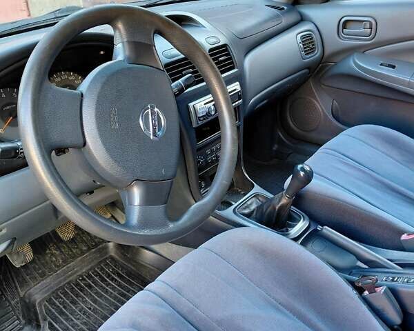 Чорний Ніссан Альмера, об'ємом двигуна 1.6 л та пробігом 210 тис. км за 4600 $, фото 7 на Automoto.ua