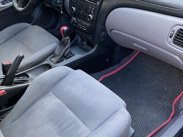 Черный Ниссан Альмера, объемом двигателя 1.6 л и пробегом 2 тыс. км за 3500 $, фото 7 на Automoto.ua