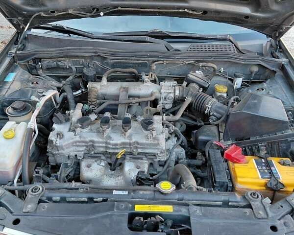 Чорний Ніссан Альмера, об'ємом двигуна 1.6 л та пробігом 210 тис. км за 4600 $, фото 13 на Automoto.ua