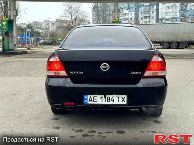 Чорний Ніссан Альмера, об'ємом двигуна 1.6 л та пробігом 245 тис. км за 4600 $, фото 3 на Automoto.ua