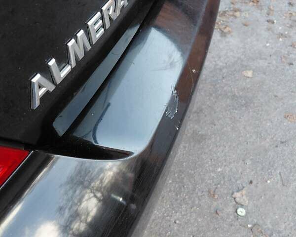 Чорний Ніссан Альмера, об'ємом двигуна 1.6 л та пробігом 210 тис. км за 4600 $, фото 3 на Automoto.ua