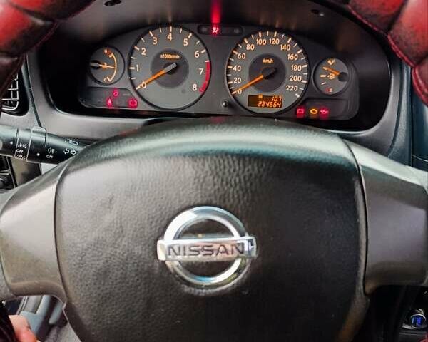 Черный Ниссан Альмера, объемом двигателя 1.6 л и пробегом 224 тыс. км за 3300 $, фото 7 на Automoto.ua