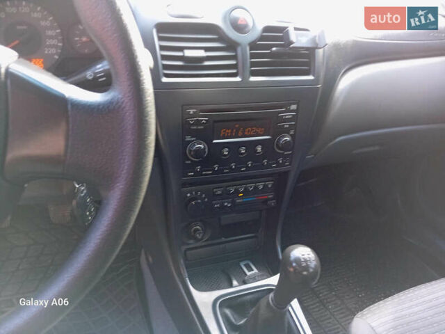 Черный Ниссан Альмера, объемом двигателя 1.6 л и пробегом 185 тыс. км за 4500 $, фото 49 на Automoto.ua