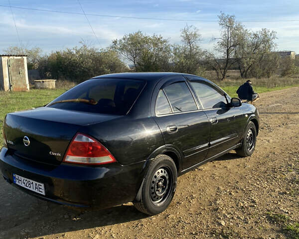 Черный Ниссан Альмера, объемом двигателя 1.6 л и пробегом 177 тыс. км за 3800 $, фото 5 на Automoto.ua