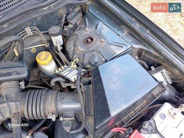 Черный Ниссан Альмера, объемом двигателя 1.6 л и пробегом 185 тыс. км за 4500 $, фото 93 на Automoto.ua