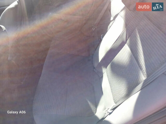 Черный Ниссан Альмера, объемом двигателя 1.6 л и пробегом 185 тыс. км за 4500 $, фото 74 на Automoto.ua