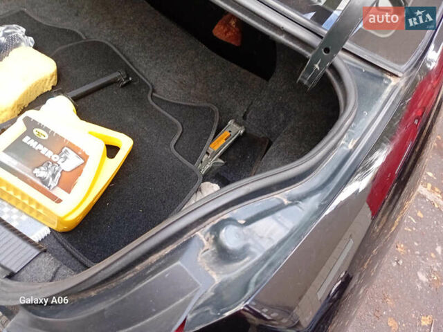 Чорний Ніссан Альмера, об'ємом двигуна 1.6 л та пробігом 185 тис. км за 4500 $, фото 98 на Automoto.ua