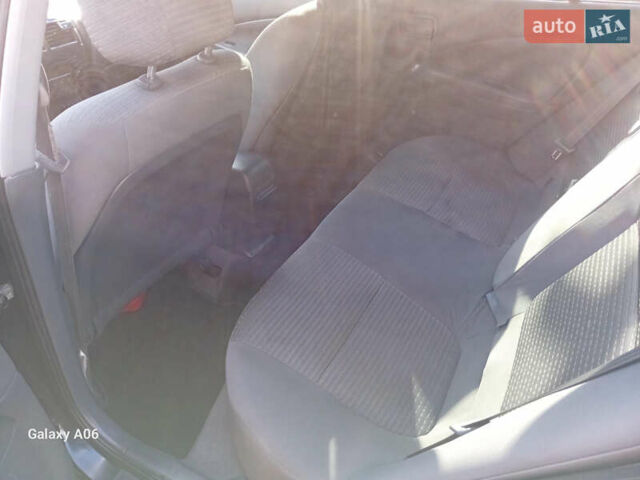 Черный Ниссан Альмера, объемом двигателя 1.6 л и пробегом 185 тыс. км за 4500 $, фото 71 на Automoto.ua