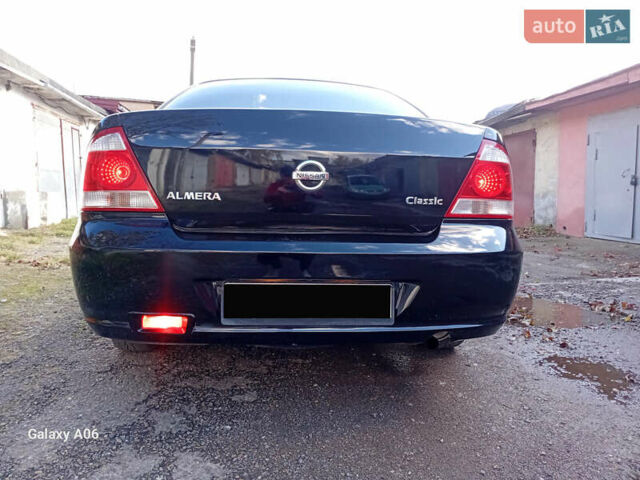 Черный Ниссан Альмера, объемом двигателя 1.6 л и пробегом 185 тыс. км за 4500 $, фото 17 на Automoto.ua