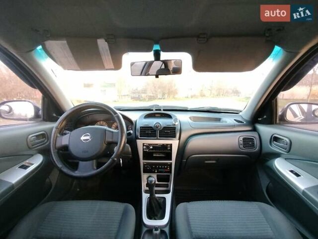 Черный Ниссан Альмера, объемом двигателя 1.6 л и пробегом 244 тыс. км за 4500 $, фото 31 на Automoto.ua