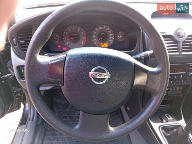 Черный Ниссан Альмера, объемом двигателя 1.6 л и пробегом 185 тыс. км за 4500 $, фото 47 на Automoto.ua