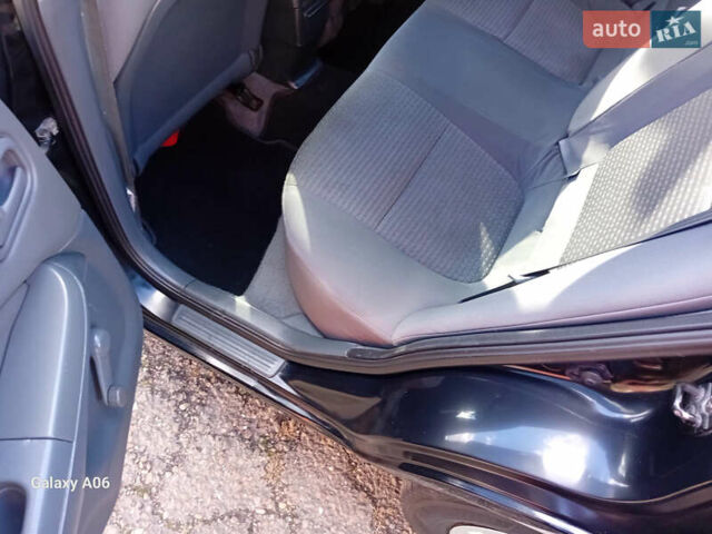 Черный Ниссан Альмера, объемом двигателя 1.6 л и пробегом 185 тыс. км за 4500 $, фото 67 на Automoto.ua