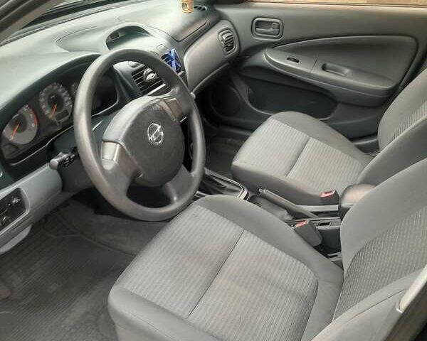 Черный Ниссан Альмера, объемом двигателя 1.6 л и пробегом 180 тыс. км за 4000 $, фото 11 на Automoto.ua