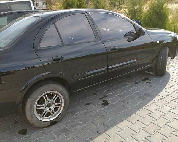 Черный Ниссан Альмера, объемом двигателя 1.6 л и пробегом 230 тыс. км за 5000 $, фото 6 на Automoto.ua